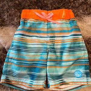 NWOT Boys Zero Exposure Size 4 swim trunks.